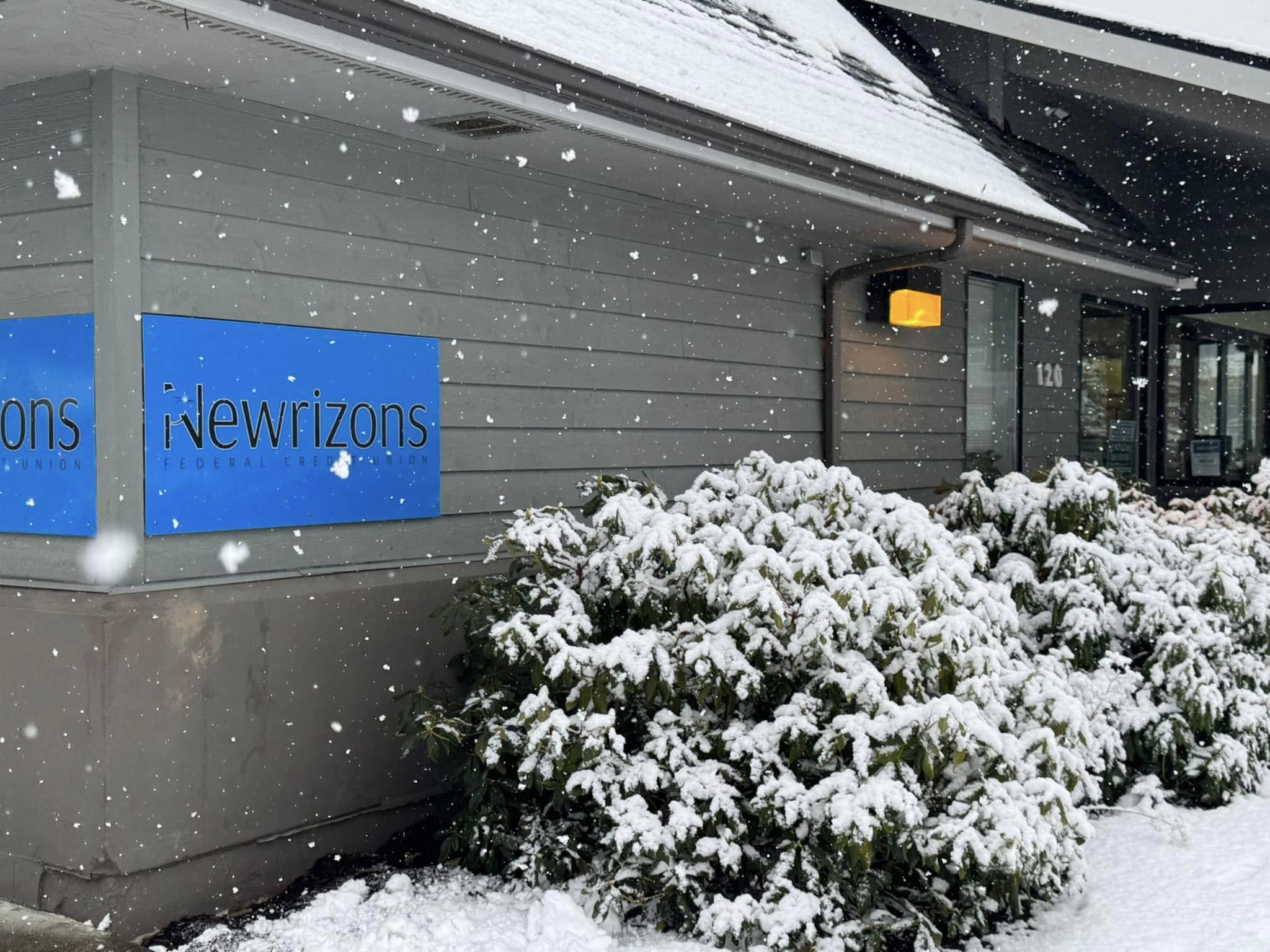 Snow covered Newrizons sign